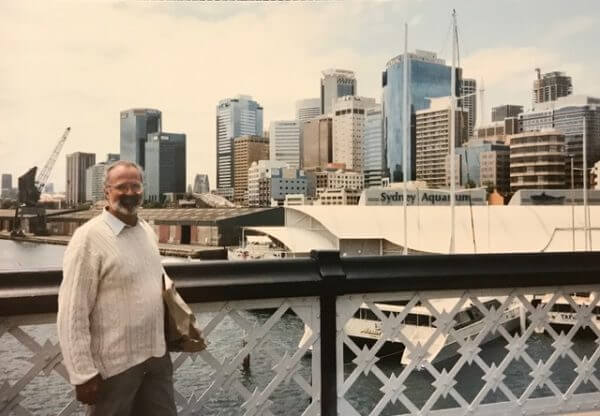 Russell stading on bridge in Sydney
