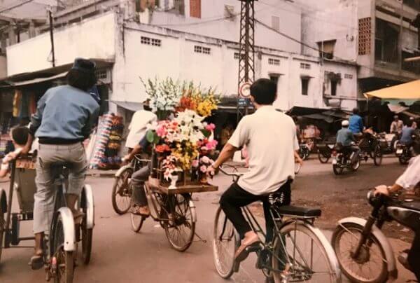 Men riding bicycles in Vietnam