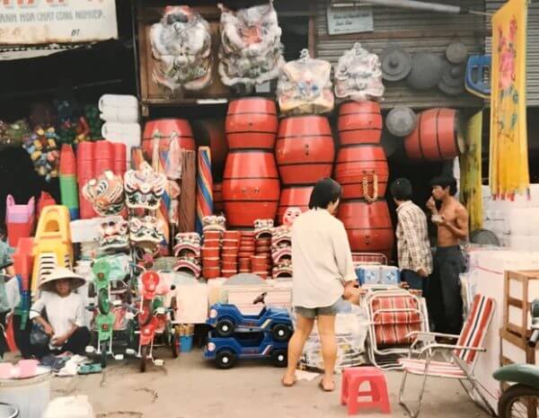 Vendor selling goods in Vietnam