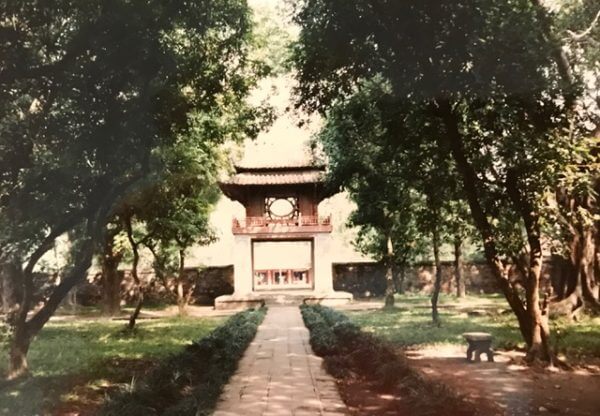 Front view of temple with brick pathway