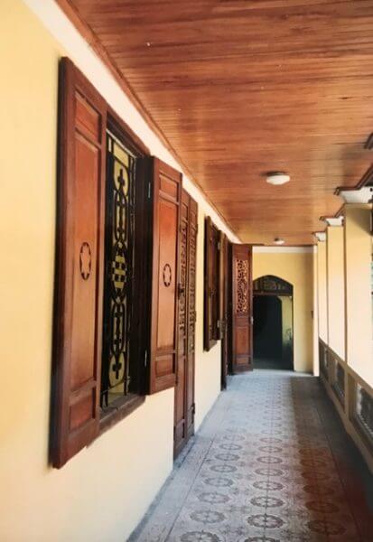 Hallway wth wooden doors