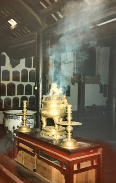 Big golden incense burner with smoke