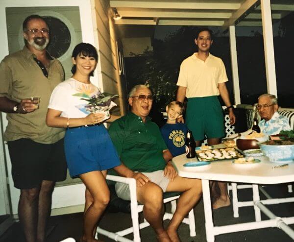 People celebrating around a kitchen table