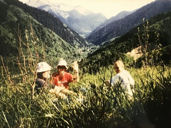 people sitting on a mountain