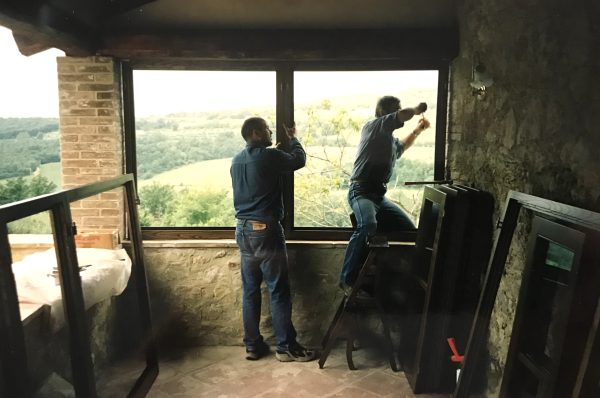 men working on the interior of a house
