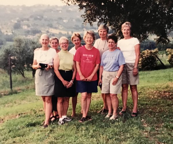 women under a tree