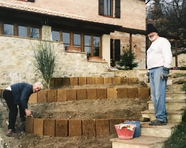 man working on a garden