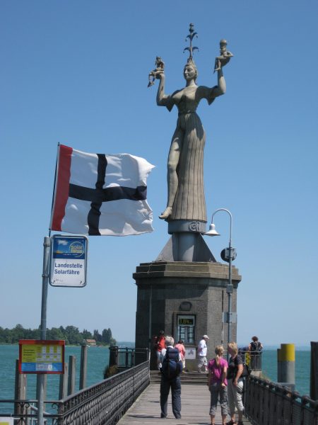 statue, bare-breasted woman